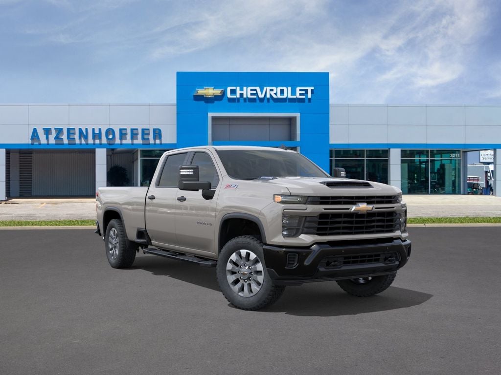 2026 Chevrolet Silverado 2500 HD Custom in White Sands — front three-quarter view