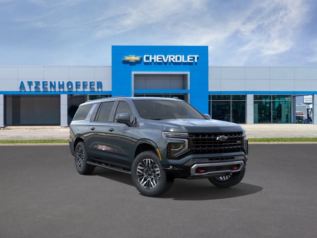 2026 Chevrolet Suburban Z71 in Cypress Gray — front three-quarter view