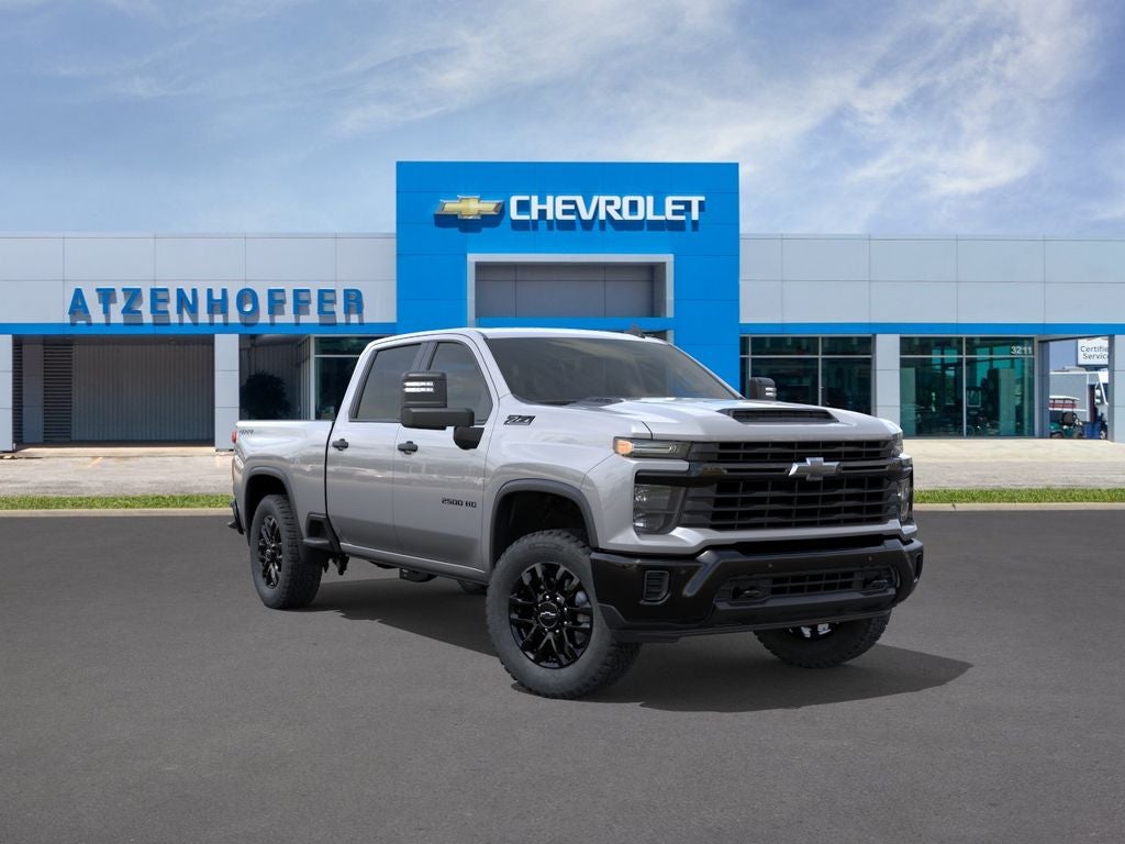 2026 Chevrolet Silverado 2500 HD Custom in Sterling Gray Metallic — front three-quarter view