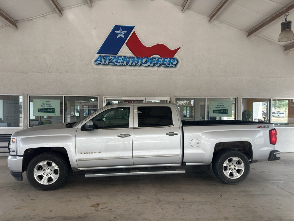 2018 Chevrolet Silverado 1500 LTZ in Silver Ice Metallic — front three-quarter view