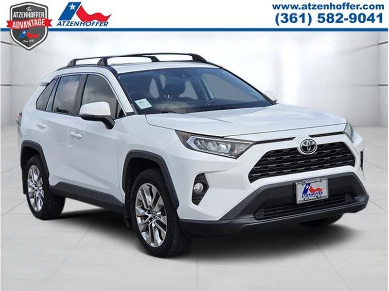 2019 Toyota RAV4 XLE Premium in White — front three-quarter view