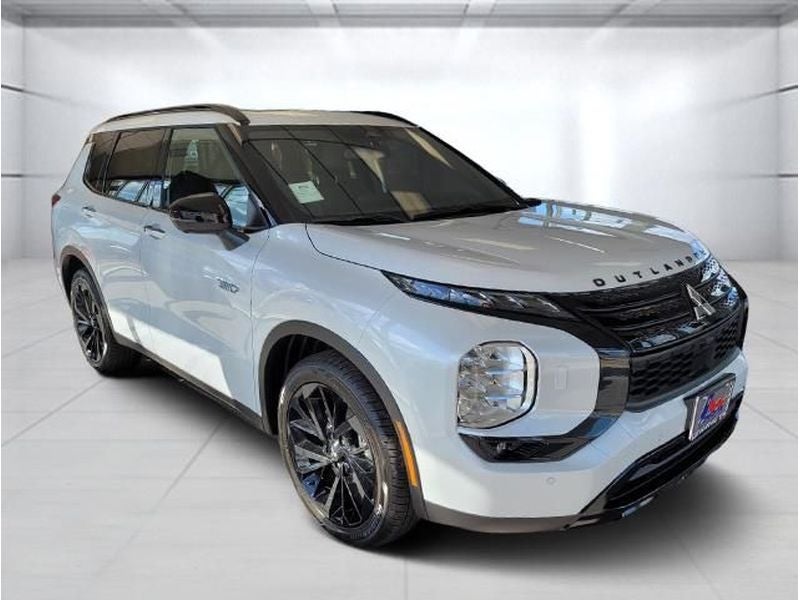 2024 Mitsubishi Outlander PHEV SEL in Diamond White — front three-quarter view